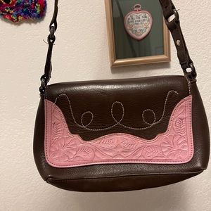 Vintage leather southern cowgirl over the shoulder purse with pink detailing